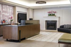a lobby with a reception desk and a fireplace at Marriott Vacation Club®, San Francisco   in San Francisco