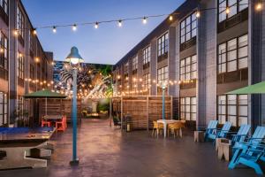 a courtyard of a building with tables and chairs at Marriott Vacation Club®, San Francisco   in San Francisco