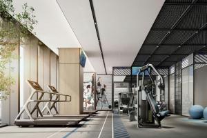 a gym with treadmills and exercise equipment at Four Points by Sheraton Rizhao Central Activities Zone in Rizhao
