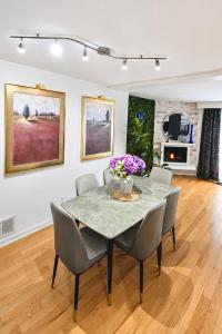 a dining room with a table and chairs at North York Quiet Room#2 in Toronto