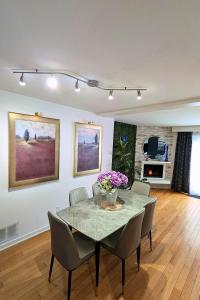 a dining room with a table and chairs at North York Quiet Room#2 in Toronto