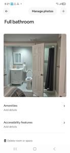 a bathroom with a sink and a toilet in a room at BASEMENT APARTMENT Two Bedrooms in Whitby