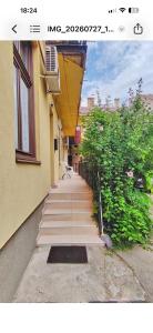 a group of stairs leading up to a building at SenoRita2 Magánszállás in Miskolc