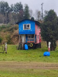 a house that is sitting on top of a field at Birloche in Butalcura