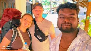 a group of people posing for a picture at TJ JANSE guest inn in Trincomalee