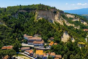 an aerial view of a house on a mountain at Hotel Melnik Хотел Мелник in Melnik