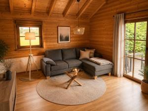 a living room with a couch and a table at Gerhelm 3 in Velden