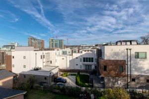 a view of a city with white buildings at Spacious Gulch Retreat Super Skyline Views in Nashville
