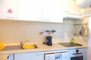 a kitchen with a sink and a counter top at Beaches within walking distance private parking! in Six-Fours-les-Plages
