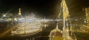 a group of boats docked in a harbor at night at Beaches within walking distance private parking! in Six-Fours-les-Plages +13 photos