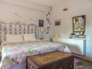 Tempat tidur dalam kamar di St. Thomas Bed and Breakfast