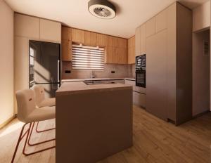 a kitchen with a large island in a room at Theo's Garden Villa in Kefalos