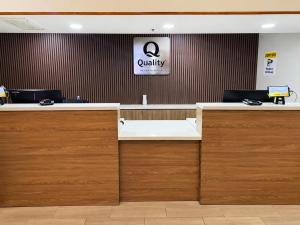 an empty lobby with a waiting room with aania sign on the wall at Quality Inn Casa Grande I-10 in Casa Grande +23 photos