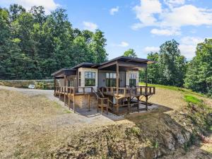 a house on a hill with a gazebo at Cambridge Cabin in Stanton