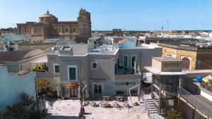 an aerial view of a city with a building at MESSAPIA HOME Apartments in Mesagne