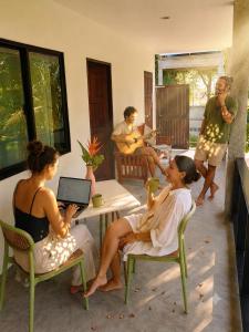 a group of people sitting in a living room at The Verandas in Hinkong