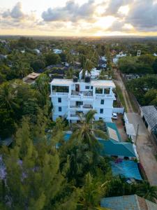 an aerial view of a white building at Diani Luxe Villa in Mombasa +50 photos