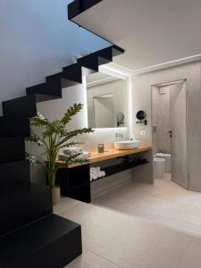a bathroom with a sink and a mirror at Tradomari in Mesagne +43 photos