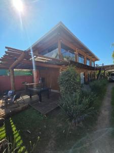 a house with a pool table in front of it at Formosa Suites in Bonito +17 photos