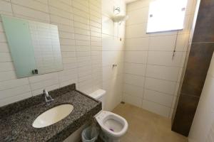 Et badeværelse på Hotel Flat Ipatinga