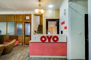 an office with an oro sign on a counter at Hotel O by OYO Dhruv Inn in Izatnagar