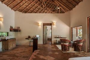 a living room with a table and chairs at Casa Macagua in El Puertecito