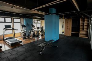 a gym with several treadmills and exercise bikes at 1503 A - INARA Downtown Four in Guatemala