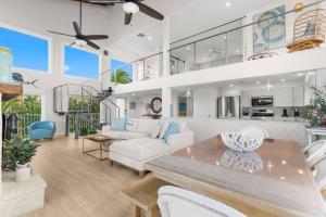 a living room with a couch and a table at Blanco Bay Key in Duck Key