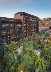 an overhead view of a building with trees and buildings at Mandarin Oriental, Barcelona in Barcelona