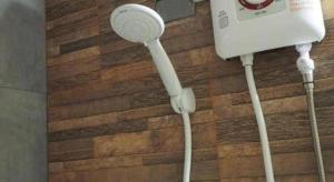 a white hair dryer attached to a wall at The Nest Hotel in Sathani Phu Khao Lat +48 photos