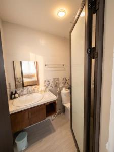 a bathroom with a sink and a toilet at VEC Homes - Triển lãm VEC Đông Anh in Dong Anh +51 photos