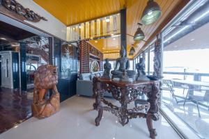 a room with a table with a statue on it at Crystal Sea Villa in Ko Larn +81 photos