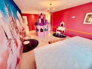 Llit o llits en una habitació de Hotel del Juguete