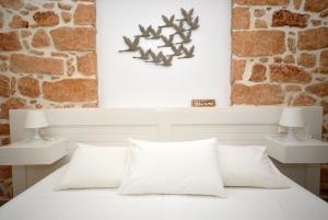 Galini Hotel Bed and Breakfast客房内的一张或多张床位
