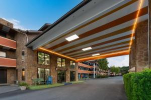 an external view of a building with awning at Days Inn By Wyndham Pigeon Forge South in Pigeon Forge
