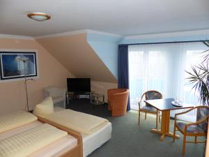 Posezení v ubytování Hotel Aggertal