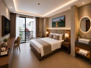 a bedroom with a large bed and a large window at Minerva Prestige Hotel in Hanoi