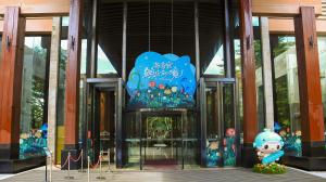 a building with a sign on the front of it at Shenzhen Dameisha Kingkey Palace Hotel in Shenzhen