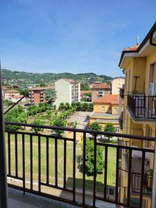 a view of a city from a balcony at The Blue Gem in Acqui Terme