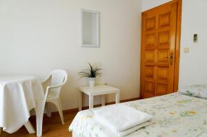 Postel nebo postele na pokoji v ubytování Guest House Heart of Budva + 20 fotografií