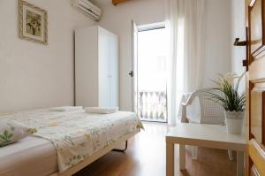 Postel nebo postele na pokoji v ubytování Guest House Heart of Budva