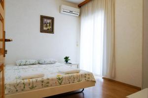 Postel nebo postele na pokoji v ubytování Guest House Heart of Budva
