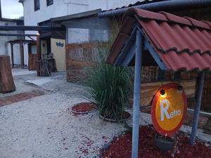 a kalo sign in front of a building at Apartman Retro 2 in Žepče