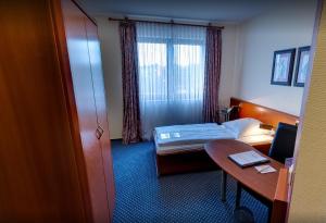 Postel nebo postele na pokoji v ubytování Hotel Victoria + 37 fotografií