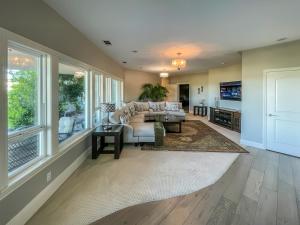 a living room with a couch and a table at Serrano Village Villa in El Dorado Hills