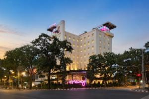 a rendering of a hotel at night at MOXY Bandung in Bandung