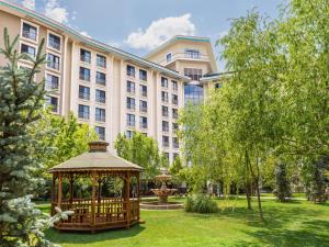 a gazebo in a park in front of a building at NG Afyon Wellness & Convention in Afyon