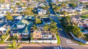an aerial view of a suburb with houses at Villa Palmera in Mossel Bay