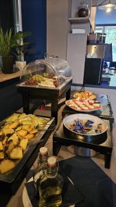 a buffet with many different types of food on display at Pension Zeitlos in Potsdam