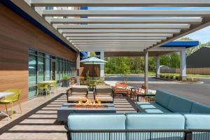 a patio with couches and a fire pit at Hampton Inn By Hilton Lawrenceburg in Lawrenceburg